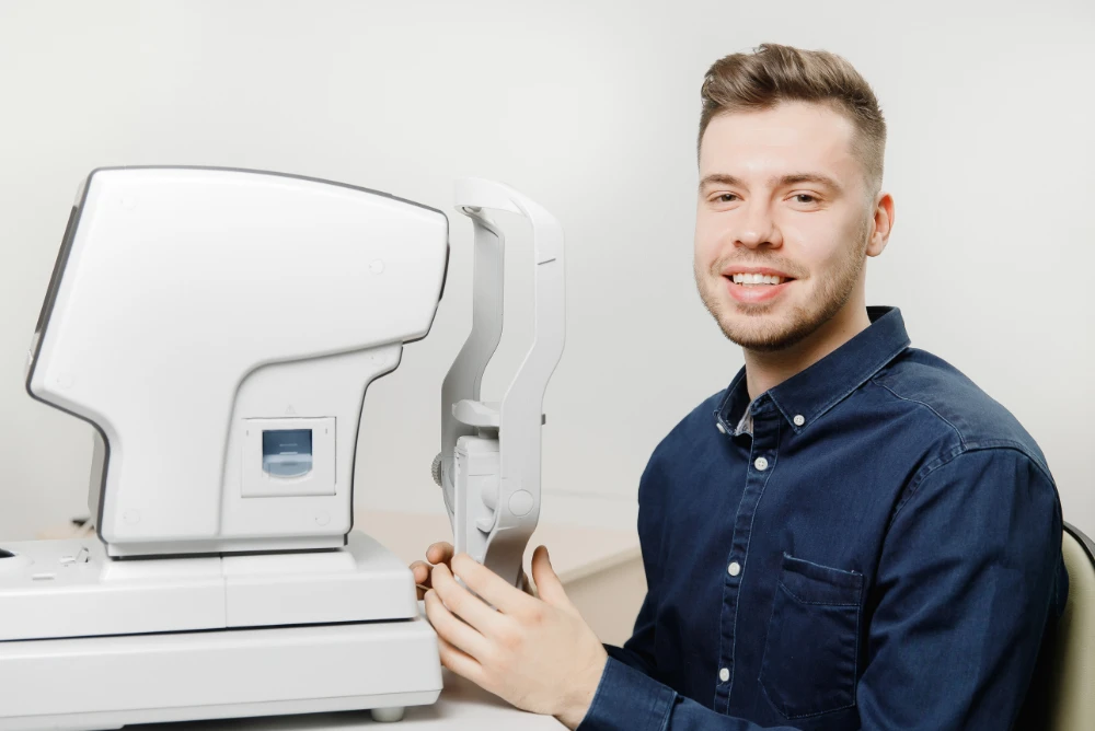 What Is An OCT Scan? - Man with eye checking equipment
