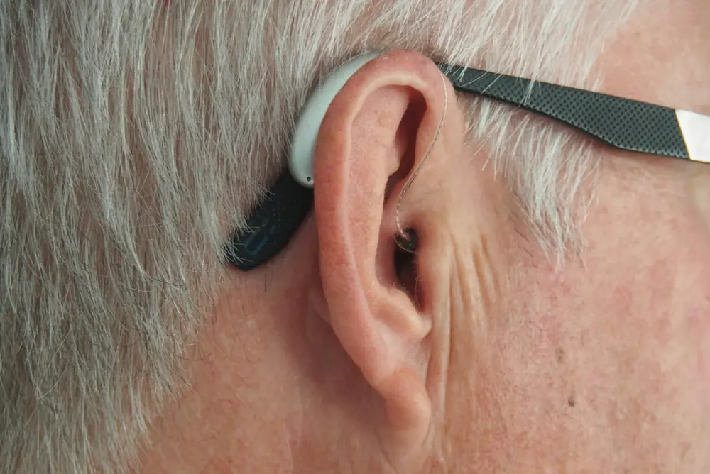 Personalised Hearing Solutions - Older man with a hearing aid
