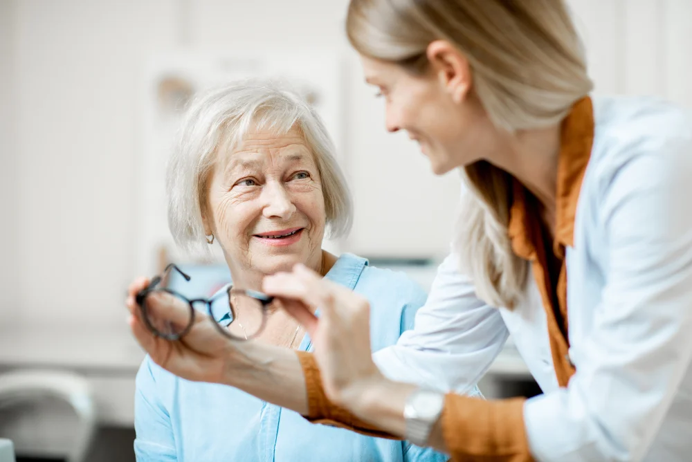Value For Money - Ophthalmologist with senior patient in the office