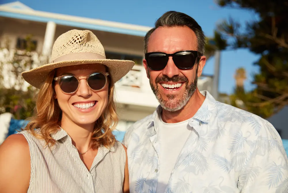 Couple wearing prescription sunglasses