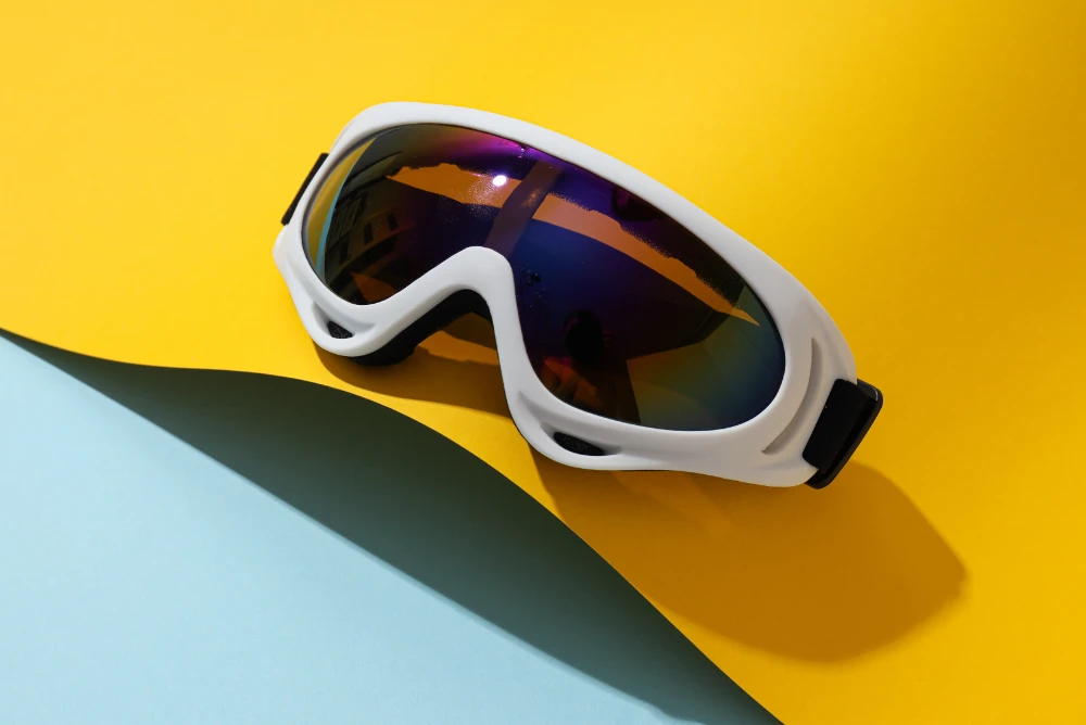 Sports Eyewear - Prescription Ski goggles on a yellow blue background