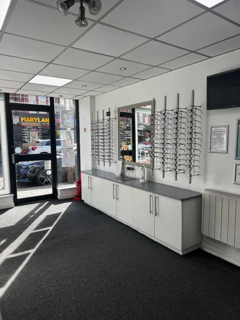 Interior of East Park Optical in Leicester showing the entrance, reception counter and spectacle displays.